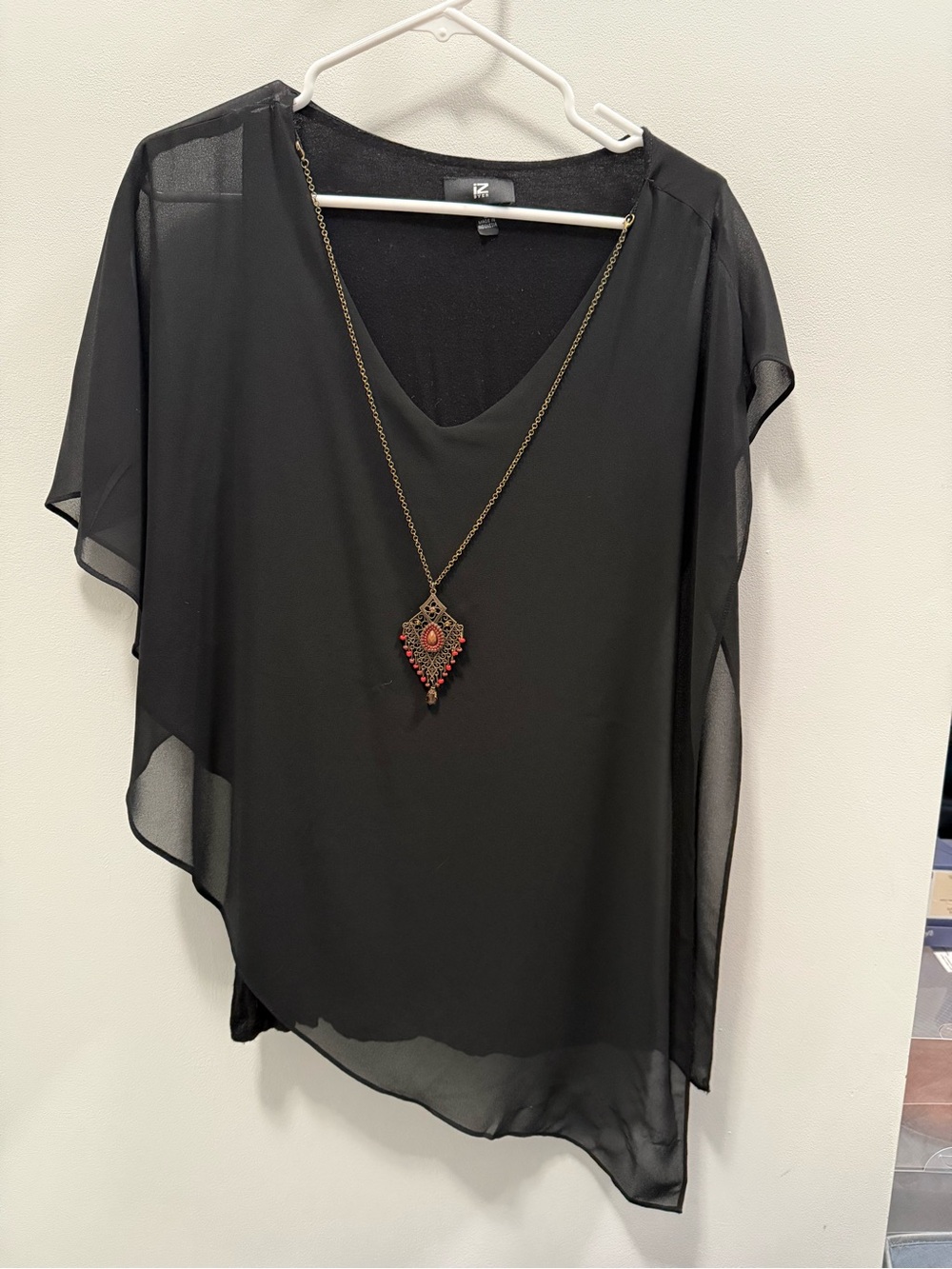 Iz Byer Black Sheer Asymmetrical V-Neck Blouse